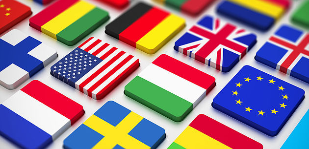 Bandeira de diversos países dando a entender sobre a tradução de textos para diferentes idiomas.
